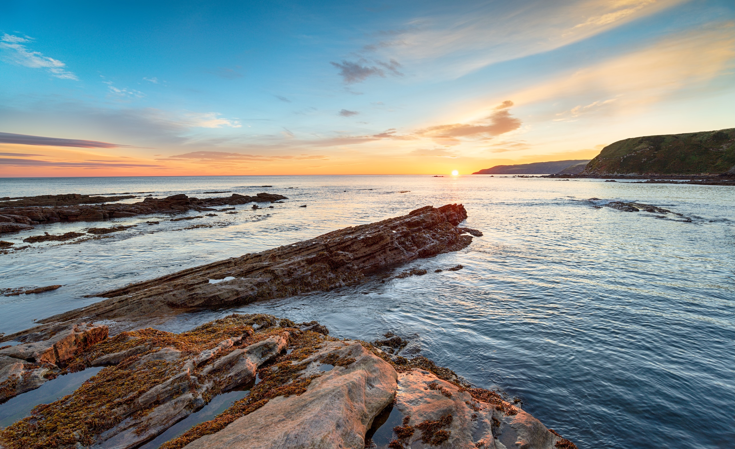 Sunrise over the beach at Cove in Scotland